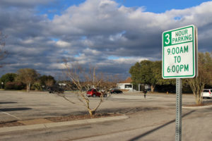 The parking lot at Wrightsville Beach Park, which is currently free. The lot lies between the tennis courts, children's play area and basketball courts. Photo by Hannah Leyva.