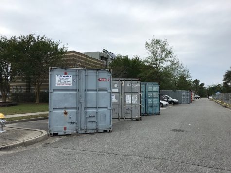 The management company in charge of Jervay Communities provided shipping containers to store the personal belongings of displaced residents. But for how long? That remains unclear. (Port City Daily photo / Benjamin Schachtman)