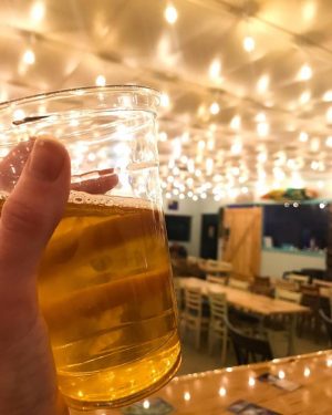 Their Island Falls Cream Ale (pictured at their 1-year birthday party) won third place in the Beer Army Beer Wars Commercial Beer Competition. (Port City Daily photo/Courtesy Makai Brewing Co.)