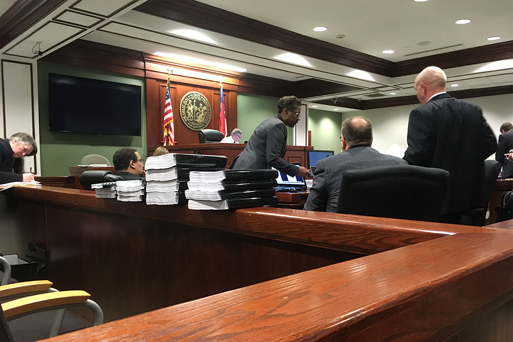 After all three parties filed motions for summary judgment, Superior Court Judge Henry spent hours reviewing new evidence introduced by Leland and H2GO in their case against Belville. (Port City Daily photo/Johanna Ferebee)