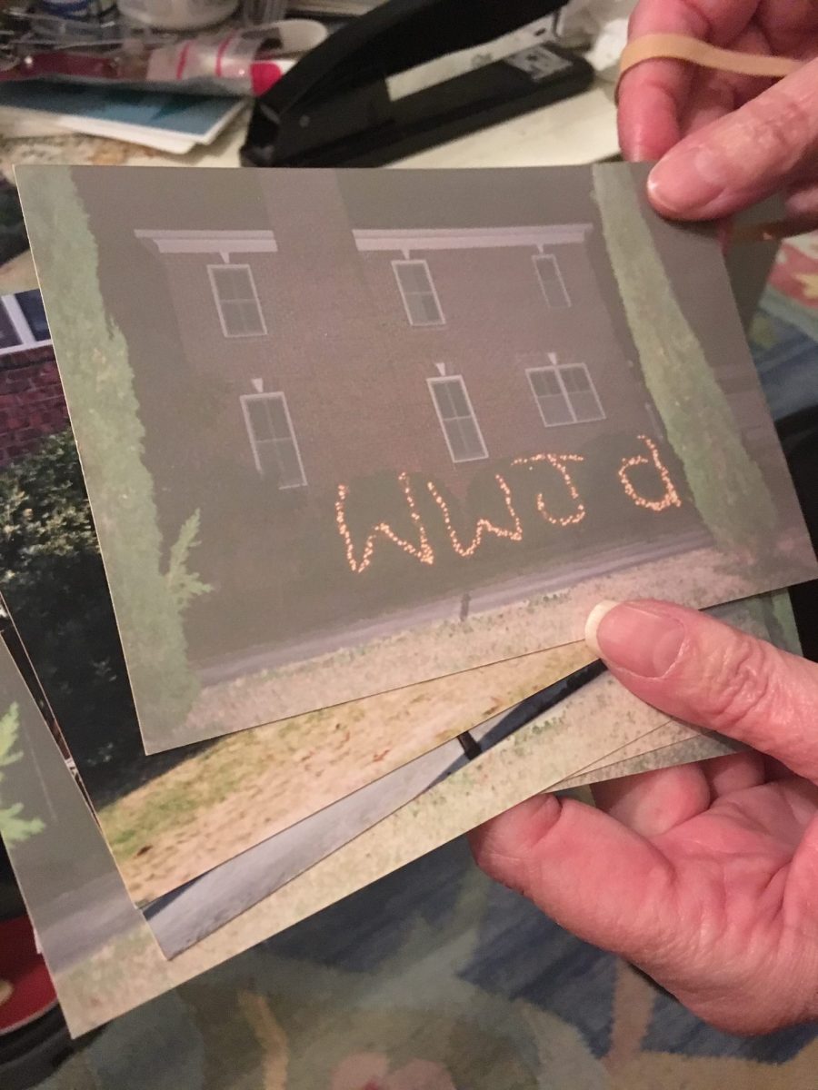 Photos of the large sign facing Virginia Radcliffe's house in 2003. (Port City Daily photo / Johanna Ferebee)