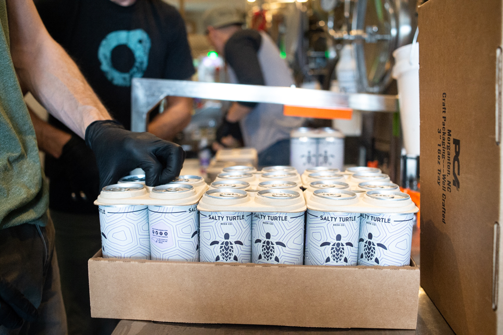 Salty Turtle is joining more than 50 other breweries across the world in using the E6PR biodegradable 4-pack and 6-pack holders to distribute its beer. (Port City Daily photo/Mark Darrough)